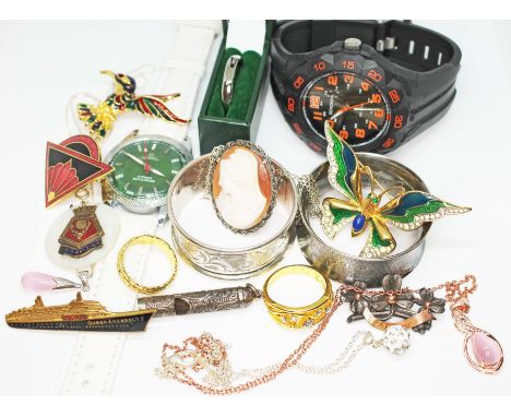A mixed lot comprising two hallmarked silver serviette rings, a miniature fob whistle, a Roamer wristwatch, a Sekonda wristwa