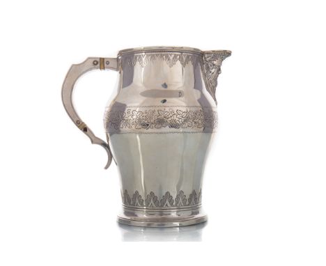 the spout modelled as a Bacchus mask with engraved borders of leaves and fruiting vines, the handle with ivory insulators, wi
