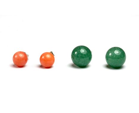 A pair of jade earrings together with a pair of polished coral earrings both mounted on 925 silver.
