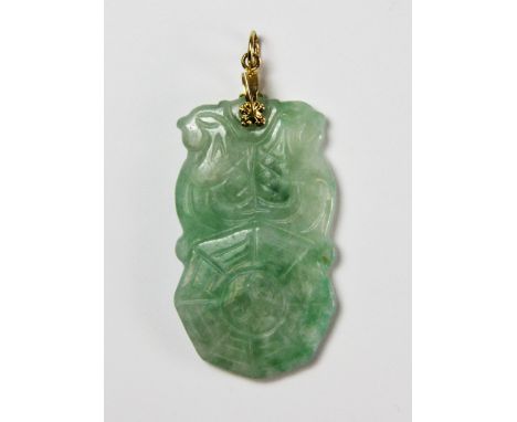 A Chinese carved jadeite jade pendant carved with Yin and Yang and two cockerels, L. 4.5cm. Private estate purchased c. 1973.