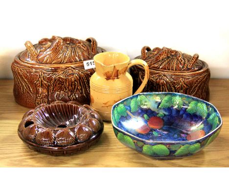 Two brown glazed ceramic game dishes and three other items.