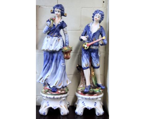 A pair of large 1960's ceramic figures, H. 96cm.