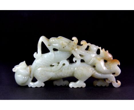 A 19th / early 20th century Chinese nephrite jade figure of a dragon with a mouse and a child, L. 14cm, H. 6cm, est. £300 - £