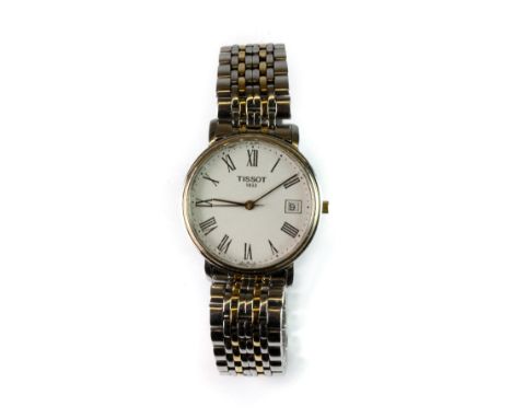 A gentleman's stainless steel Tissot bicolour wrist watch.