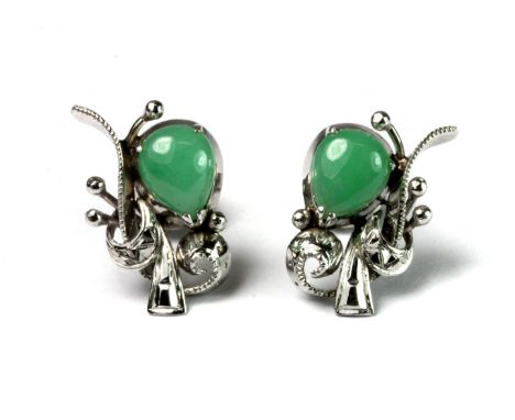 A pair of Chinese high carat white gold (with Chinese hallmarks) earrings set with polished jade.