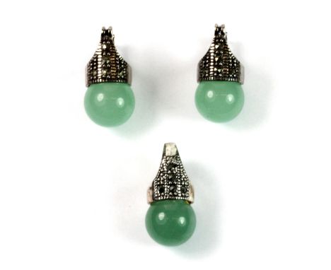 A 925 silver and marcasite mounted polished jade pendant and matching pair of earrings.