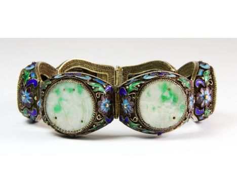 A lovely mid 20th century Chinese filigree silver gilt jade and enamel hinged bracelet, W. 2.5cm.