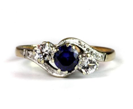 A 9ct yellow and white gold ring set with a lovely sapphire and white stones (K.5).