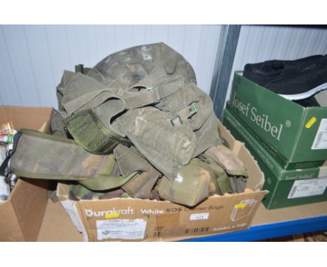 A box containing US and British army webbing
