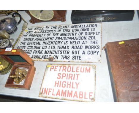 Two enamel signs