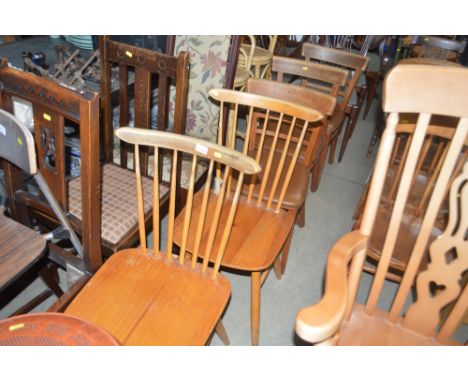 A pair of stick backed chairs; a set of three bar backed kitchen chairs