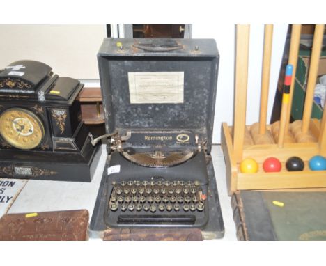 A Remington portable typewriter in fitted case
