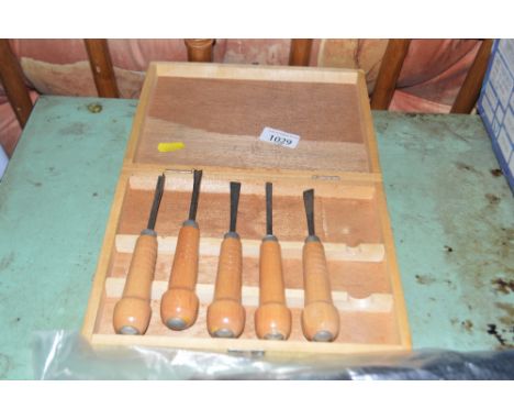 A cased set of wood working tools, one missing