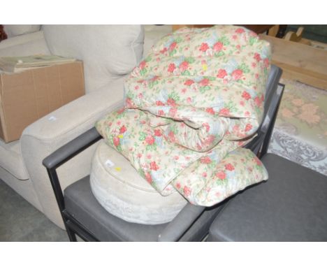 A Pouffe; and a pair of floral eiderdowns
