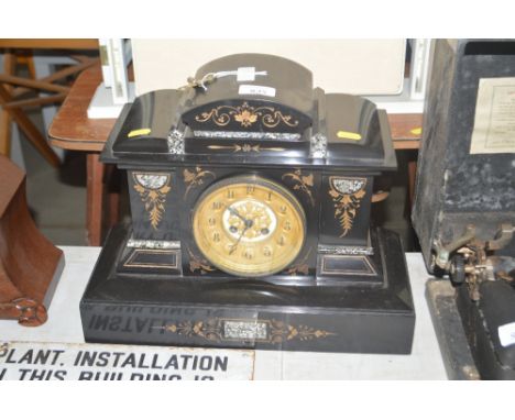 A late Victorian slate two hole mantle clock
