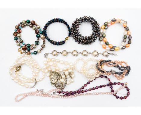 A selection of freshwater white and dyed Pearl necklaces comprising of one white strand, one white strand with white metal he