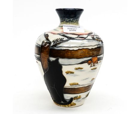 A Moorcroft narrow necked and shouldered vase in the 'Who Goes There' pattern, designed by and signed to base by Anji Davenpo
