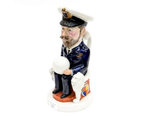 Carruthers Gould for Wilkinson, a World War One Commemorative Toby jug of King George V, 1919, modelled sitting on a throne h