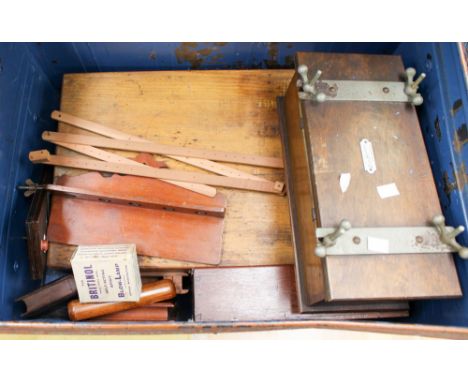 A large steamer tin trunk with contents to include tie/flower press, printing box etc