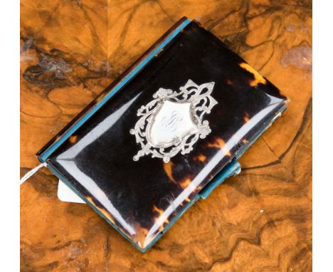 A Tortoiseshell aide memoire with interior blue silk covering, a note pad, a section for cards and a locking pencil, showing 