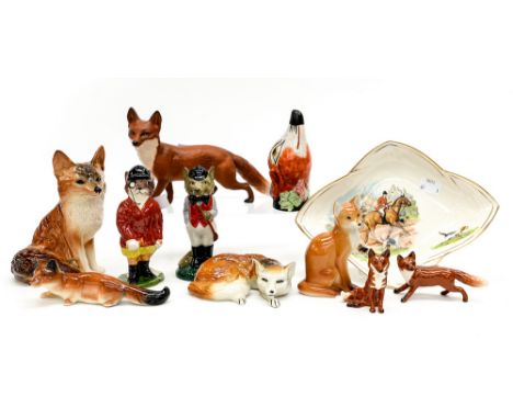 A collection of ceramics, boxes, hunting related items to include Wade, Foxy gentleman, Russian, Beswick, and a stirrup cup (