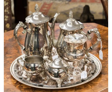 A collection of various silver plate, including coffee pot, teapot, milk jug, sugar bowl, plus three trays 