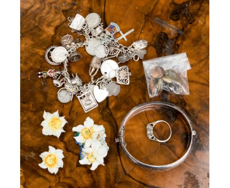 A silver charm bracelet, bangle and an a/f silver and cz ring etc 