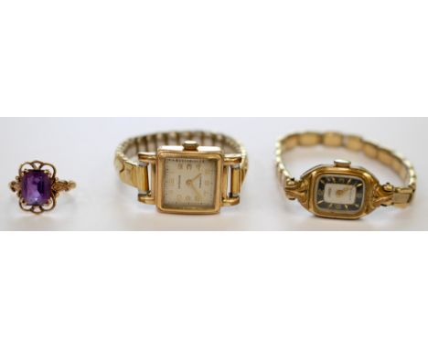 A 9ct gold amethyst ring and two ladies gold plated wristwatches by Herdosa and Stanco 