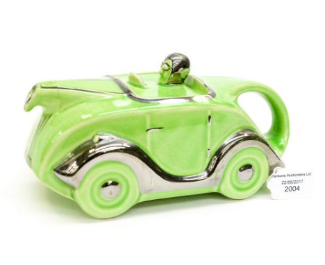 An Art Deco Sadler racing car teapot, green glazed 