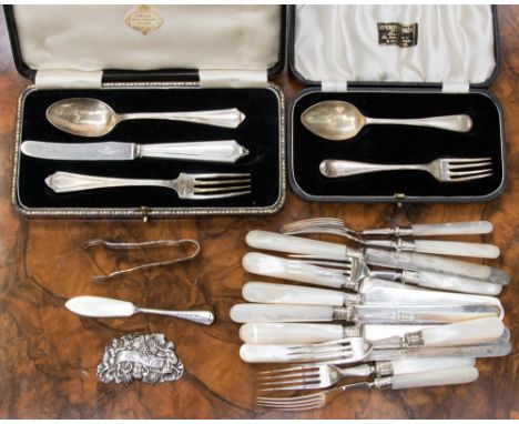 Two boxed silver child's cutlery sets; together with silver sugar nips, silver port sign, Birmingham 1836 Francis Clark, butt