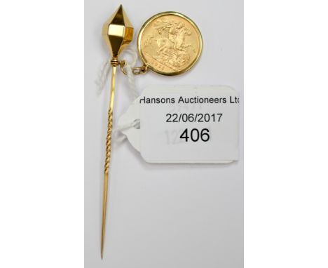 A Half Sovereign 1977, mounted on a yellow metal stick pin