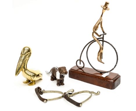 A cast iron early 20th Century (shaped as a Dog) nut cracker; together with a 1960s Continental metalware sculpture o Penny F