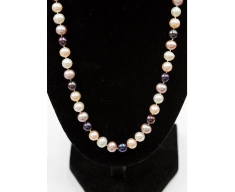 A coloured cultured pearl single row necklace with silver gilt clasp, approx 18'' long.