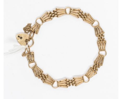 9ct gold gate link bracelet, with padlock and safety chain with a length approx 7.5'' and a weight of approx 11.6gms
