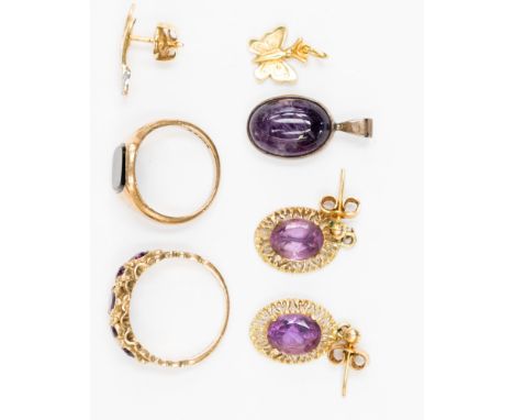 A Victorian style 9ct gold ring set with five amethysts, a cabachon amethyst pendant set in silver, a pair of amethyst and 9c