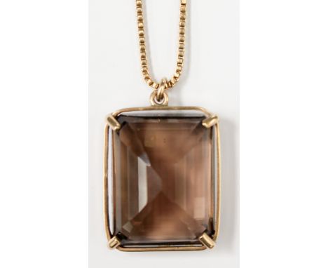 A large Smokey Quartz single stone 9ct gold pendant approx 3cm x 2.2cm in size on a box chain approx 27'' (af) 