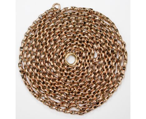 A 9ct. Victorian rose gold long guard chain, oval belcher links, approx 57'' in length, weighing approximately 27.7gms, with 