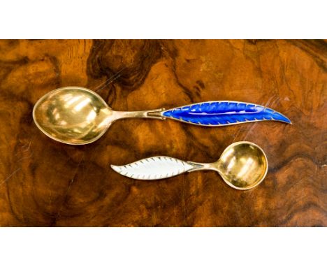 Two enamel spoons, in original box, bought in Switzerland 0.925 s. with monogram