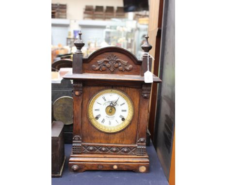 A Fattorini and Sons patent automatic alarm clock, Bradford Pat. 16226 oak cased, pendulum and key within (loud alarm) circa 