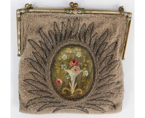 A French 1920s beadwork and embroidered evening bag with enamel flower detail with border a/f