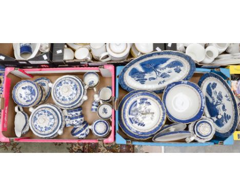 Two boxes of assorted blue and white ceramics, including cake plate, various dinner plates, teapot, bowls, tureens, mugs, cup