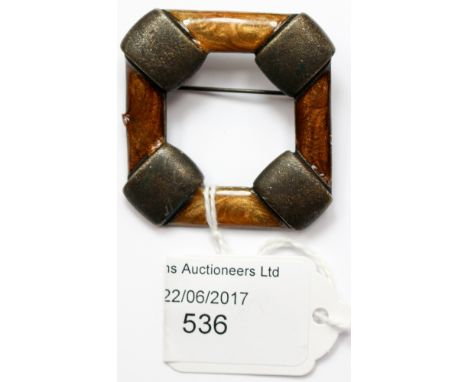 A Celtic/Scandinavian brooch with gold tone enamel, square design, measuring approx 40mm 
