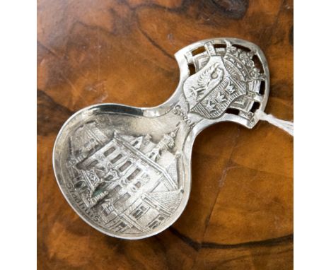 A Dutch silver caddy spoon, cast with Sneek Stadhuis and coat of arms 