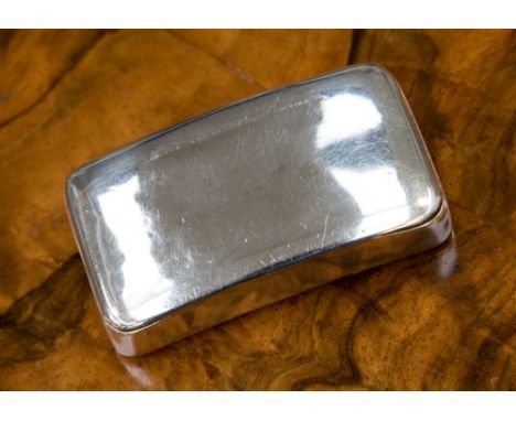 A George III silver snuff box in plain silver, curved in shape, hallmark London 1805, maker probably John Lambe, dimensions a