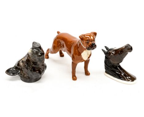 A Beswick Boxer dog, a wall figure head, Beswick Arab, together with a Bloor China, Stoke on Trent stirrup cup modelled as a 