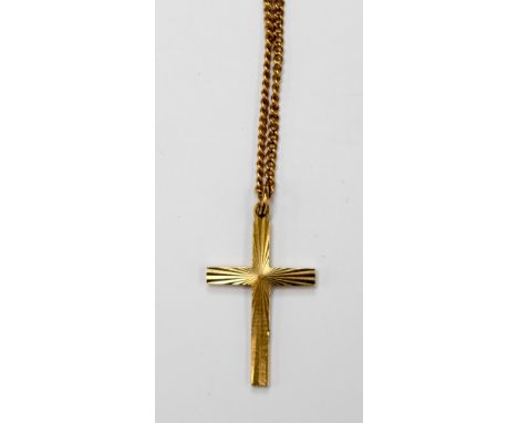 A 9ct gold crucifix pendant on chain, 4.1 grams 