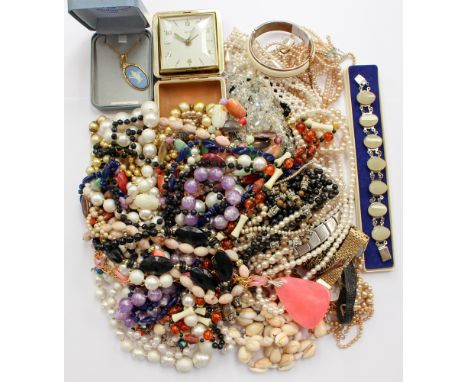 A collection of costume jewellery comprising of faceted rainbow glass beads, boxed faux pearls, Wedgwood pendant, a Smith tra