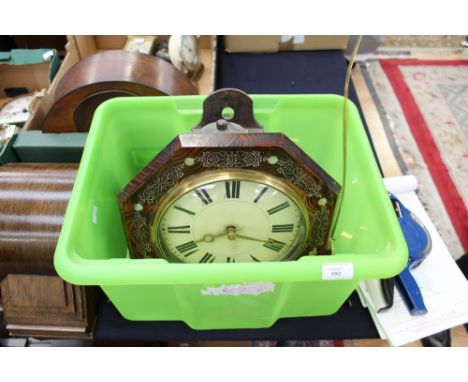 An oak cased Postman's clock with Roman numerals in hexagon case with mother of pearl inlay