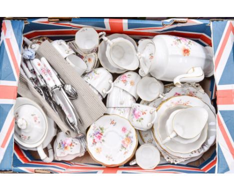 A Royal Crown Derby Derby Posies part tea set, comprising teapot, coffee pot, teacups, saucers, coffee cups and saucers, side