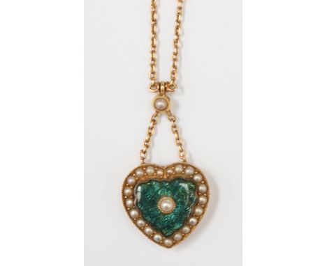 A yellow metal mourning pendant in the shape of a heart, with a green enamelled centre with engine turned leaf pattern, with 